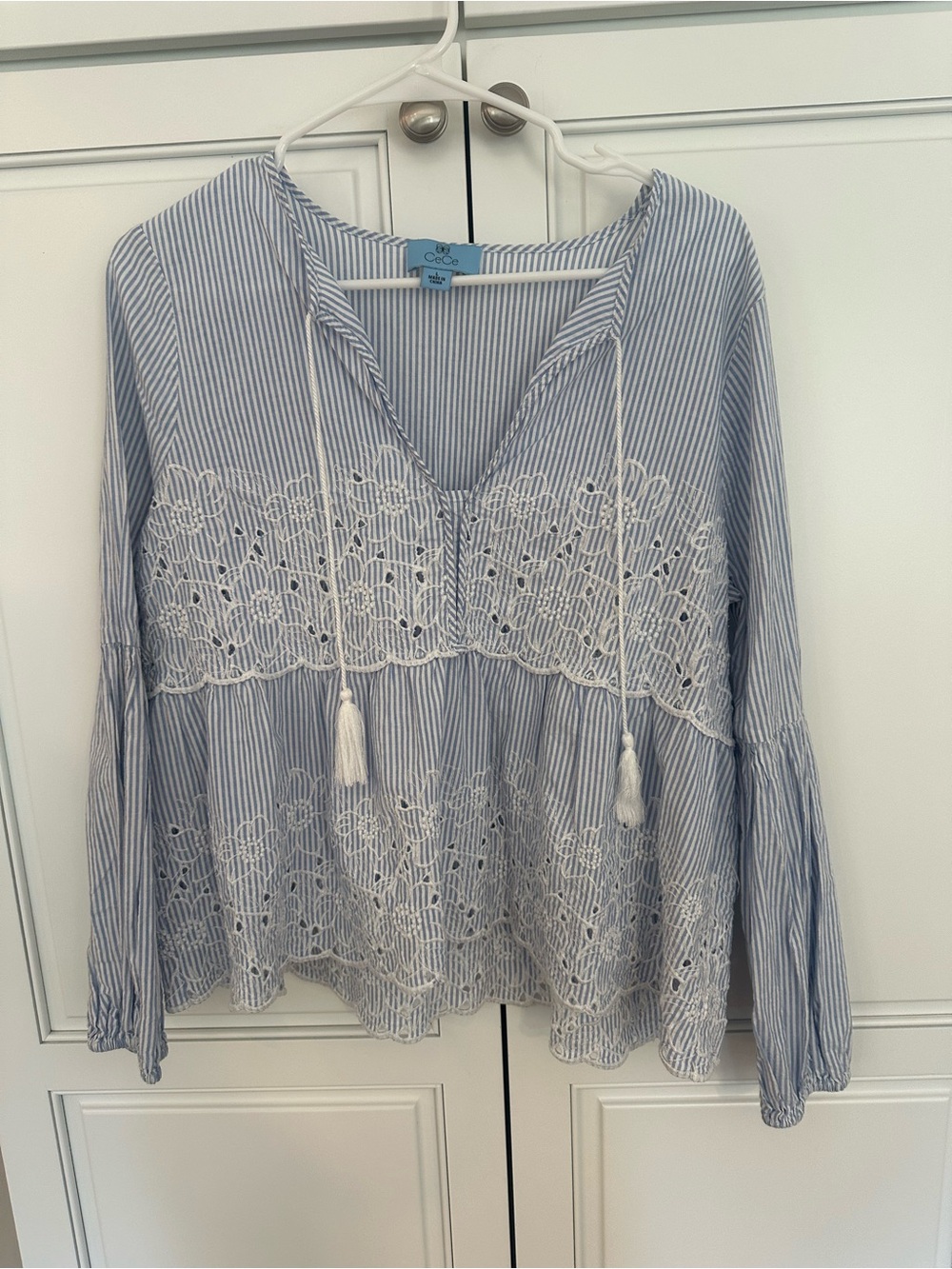 CeCe Blue and White Striped Lace-Paneled Peasant  Blouse. Size large.